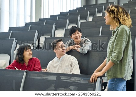Group of multinational students having a conversation in a classroom