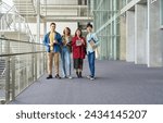 Group of multinational students smiling and lining up at university