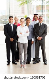 Group Of Multiracial Businesspeople Standing Together In Office