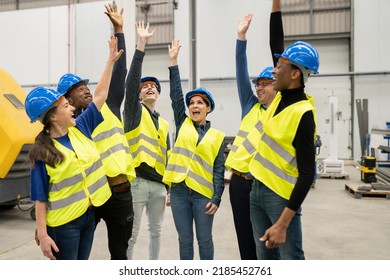 Group Multiracial Engineers Men And Women, High Five Hands In Factory, Celebrating Holiday.