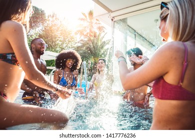 Group Of Multiracial Friends Having Fun At Pool Party - Young Happy People Enjoying Summertime In A Hotel Resort