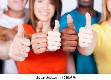 Group Of Multiracial Friends Thumbs Up