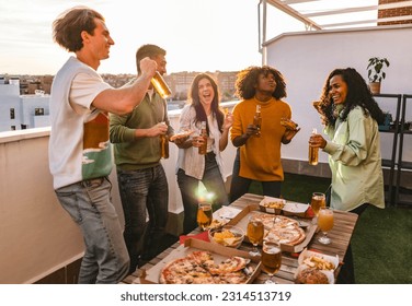 group of multiracial millennial friends on rooftop party - Powered by Shutterstock