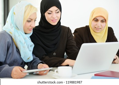 Group Of Muslim Women Working