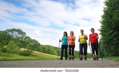 A Group Of Nordic Walking Woman In Nature