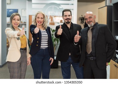 Group of office workers doing ok symbol at camera in clcihe image - Shutterstock ID 1354305350