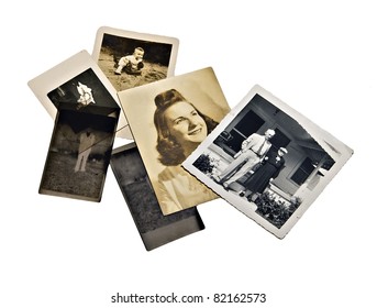A group of old family photos and negatives on white background.