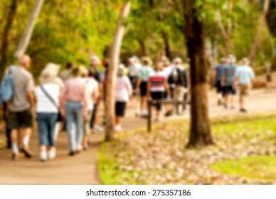 Group Of Old And Healthy People Walking In The Nature, Blurred