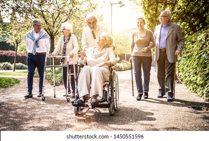 Group Of Old People Walking Outdoor