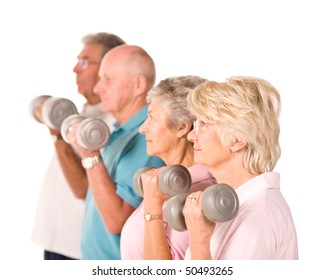 Group Of Older Mature People Lifting Weights In The Gym