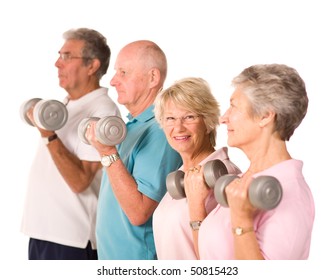 Group Of Older Mature People Lifting Weights In The Gym