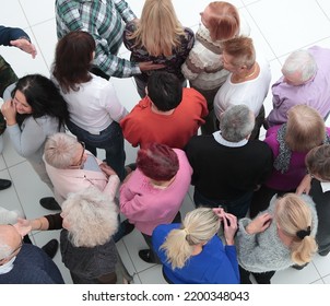 Group Of Older People Looking In The Same Direction.