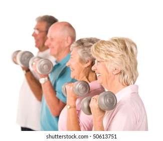 Group Of Older Senior People Lifting Weights In The Gym