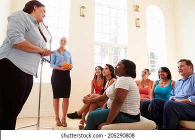 Group Of Overweight People Attending Diet Club