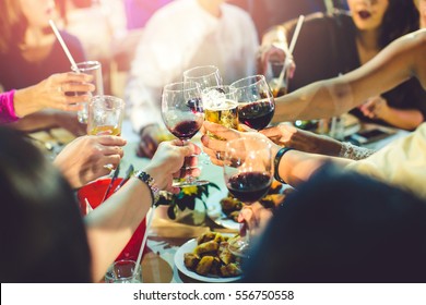 Group of partying girls clinking flutes with sparkling wine,Friend - Powered by Shutterstock