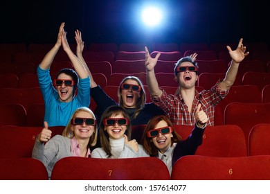 Group Of People In 3D Glasses Watching Movie In Cinema