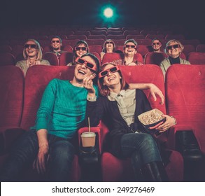 Group Of People In 3D Glasses Watching Movie In Cinema