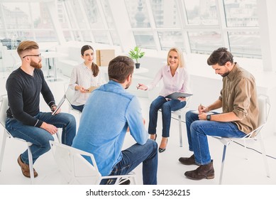 Group Of People Actively Making Discussion