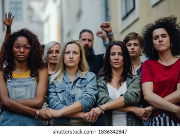 Group of people activists protesting on streets, women march and demonstration concept. - Shutterstock ID 1836342847