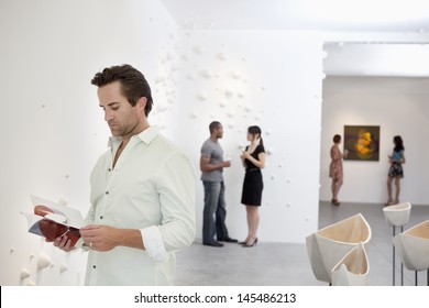 Group Of People In Art Gallery