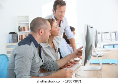 Group Of People Attending Management Training Course