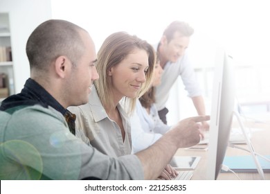 Group Of People Attending Management Training Course