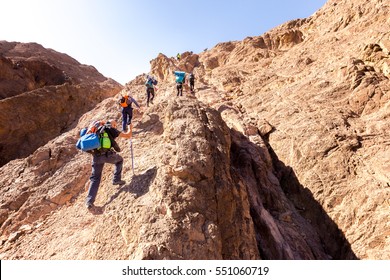 Group People Backpackers Tourists Climbing Struggling Ascending Rock Cliff Desert Mountain Ridge Travel Negev Nature Israel Tourism Destination Hiking.