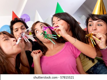 Group Of People At A Birthday Party Having Fun