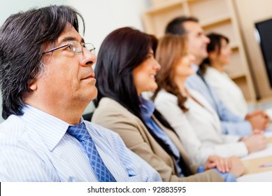 Group Of People In A Business Meeting