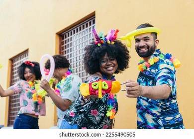 Group of people in Carnival in the streets of Barranquilla, Colombia. - Shutterstock ID 2255490505