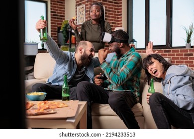 Group Of People Celebrating Video Games Victory On Tv Console, Playing Game With Virtual Reality Glasses To Win. Happy Friends Enjoying Fun Activity, Gathering At House Party.