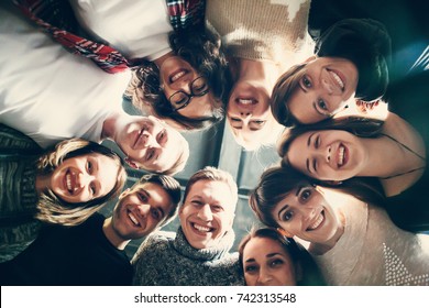 Group Of People In Circle . Friends Looking Down  . Concepts About Friendship,lifestyle,unity,business And Teamwork.