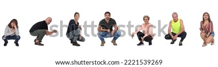 group of people crouched down on white background