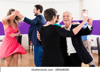 Group of people dancing in dance class having fun