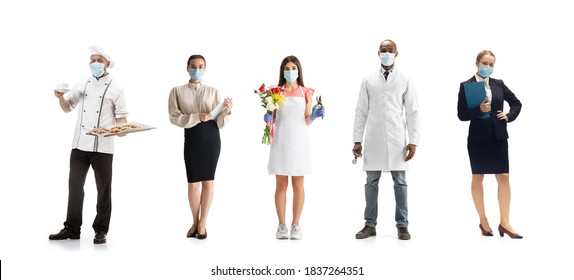 Group Of People With Different Professions On White Studio Background, Horizontal. Modern Workers Of Diverse Occupations, Male And Female Models Like Florist, Doctor, Accountant, Baker In Face Masks