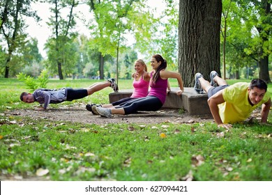 Group Of People Doing A Outdoor Workout In The Park