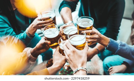 Group of people drinking beer at brewery pub restaurant - Happy friends enjoying happy hour sitting at bar table - Closeup image of brew glasses - Food and beverage lifestyle concept - Shutterstock ID 2297418259