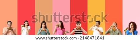 Group of people eating tasty sandwiches on color background with space for text