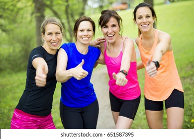 A Group Of People Enjoying In The Fitness Having Fun Running Outside