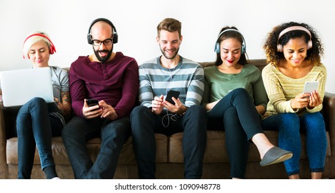 Group Of People Enjoying Music Streaming