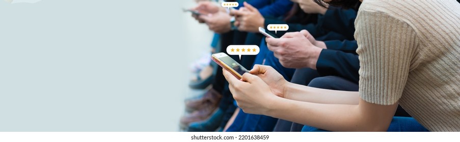 Group Of People Hands Using Smartphone With Popup Five Star Icon For Feedback Review Satisfaction Five Stars Service, Customer Service Experience And Business Satisfaction Survey Concept.
