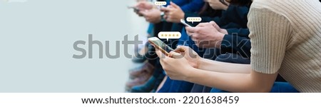 Group of people hands using smartphone with popup five star icon for feedback review satisfaction five stars service, Customer service experience and business satisfaction survey concept.
