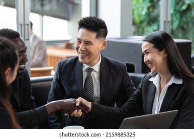 Group Of People Handshaking To Greeting Or Success Deal For Business Agreement. Diversity Businesspeople Working Together