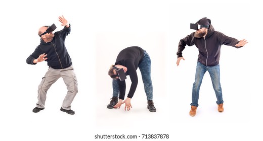 Group Of People Having Fun With Virtual Reality Glasses. Studio Shoot