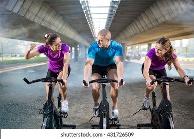 Group Of People Healthy Exercise On Spin Bike
