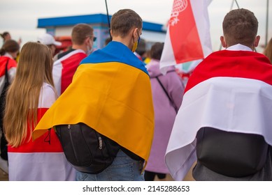 Group Of People Holding Flag. Anti-war Protest. Ukraine. Belarus