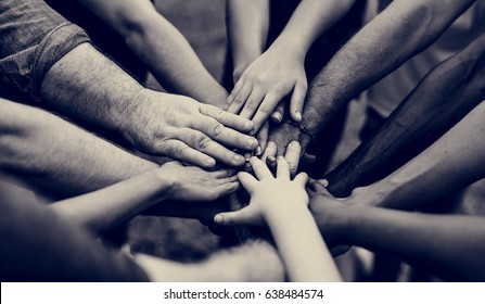 Group of people holding hand assemble togetherness