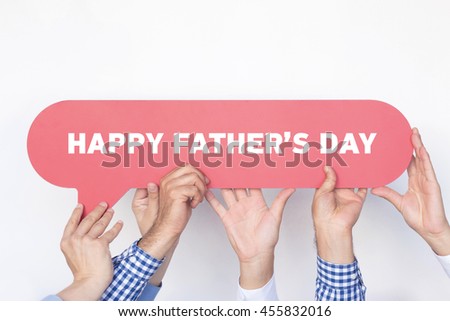 Group of people holding the Happy Father's Day written speech bubble