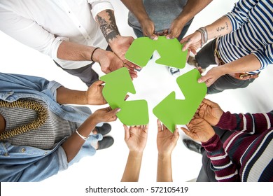 Group Of People Holding Recycling Sign Concept