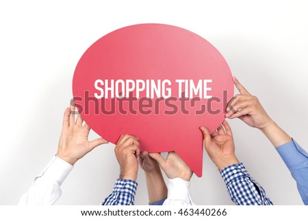 Group of people holding the SHOPPING TIME written speech bubble